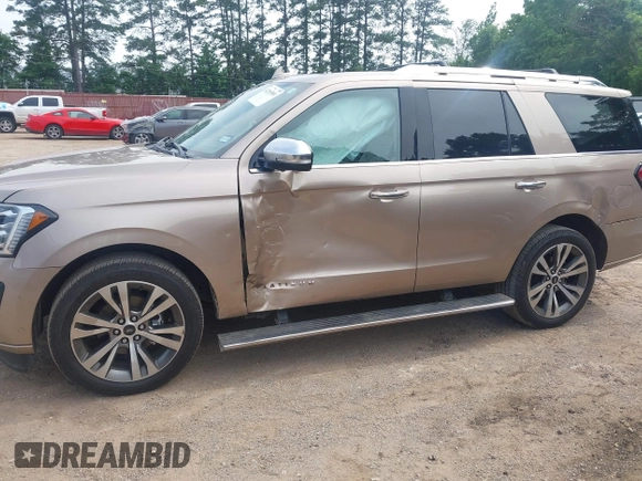 2020 Ford Expedition Platinum with VIN 1FMJU1MT6LEA51900, listed as a IAAI auction lot 42265591 with 70,022 mi miles and . Bid and sale history available at DreamBid. Image 14.