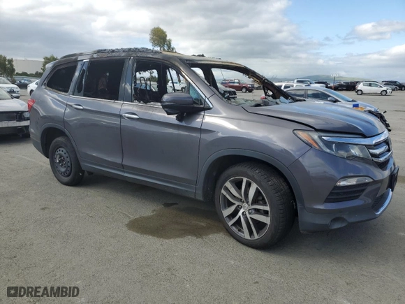 2017 Honda Pilot Touring with VIN 5FNYF6H93HB052002, listed as a Copart auction lot 50740585 with 0 mi miles and Salvage Title. Bid and sale history available at carsss.com. Image 4.