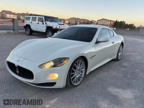 2012 Maserati GranTurismo S z VIN ZAM45KLA1C0061862, wystawiony jako Copart lot #87091844 z przebiegiem 31 825 mil mil oraz Czysty tytuł • Clean title. Historia ofert i sprzedaży dostępna na DreamBid. Obrazek 2.