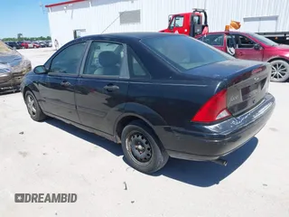 2003 Ford Focus SE with VIN 1FAFP34P83W150783, listed as a IAAI auction lot 42319653 with Not provided miles and . Bid and sale history available at DreamBid. Image 3.