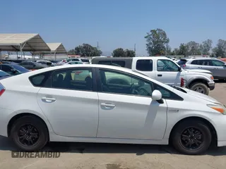 2012 Toyota Prius One z VIN JTDKN3DU3C5386610, wystawiony jako IAAI lot #42386857 z przebiegiem 171 968 mil mil oraz . Historia ofert i sprzedaży dostępna na DreamBid. Obrazek 14.
