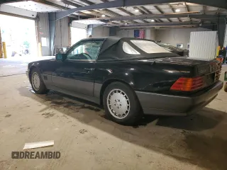 1992 Mercedes-Benz 500 z VIN WDBFA66E5NF040865, wystawiony jako Copart lot #57905205 z przebiegiem 95 158 mil mil oraz Tytuł czysty. Historia ofert i sprzedaży dostępna na DreamBid. Obrazek 2.