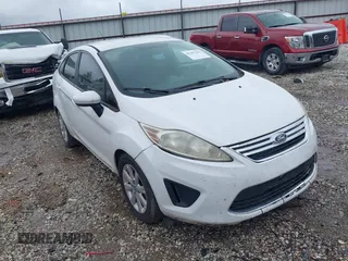 2012 Ford Fiesta SE with VIN 3FADP4BJ0CM220742, listed as a IAAI auction lot 42207303 with 175,875 mi miles and . Bid and sale history available at carsss.com. Image 1.