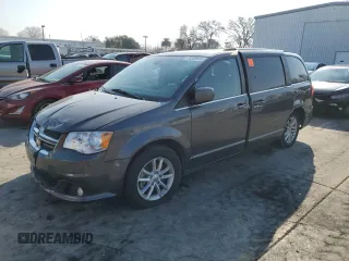 2019 Dodge Grand Caravan SXT with VIN 2C4RDGCG2KR748397, listed as a Copart auction lot 43328655 with 157,087 mi miles and Clean Title. Bid and sale history available at DreamBid. Image 1.