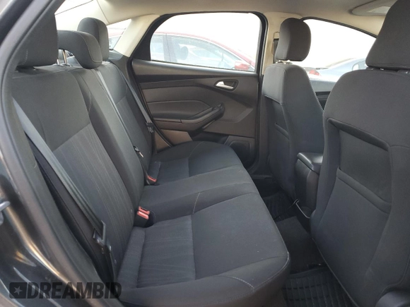 2017 Ford Focus SE z VIN 1FADP3F25HL331714, wystawiony jako Copart lot #77389764 z przebiegiem 49 953 mil mil oraz Szkoda całkowita • Salvage title. Historia ofert i sprzedaży dostępna na DreamBid. Obrazek 10.