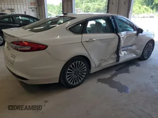 2017 Ford Fusion Hybrid Titanium z VIN 3FA6P0RU3HR400034, wystawiony jako Copart lot #62689795 z przebiegiem 109 118 mil mil oraz Szkoda całkowita • Salvage title. Historia ofert i sprzedaży dostępna na DreamBid. Obrazek 3.
