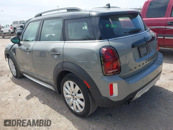 2022 MINI Countryman Cooper S with VIN WMZ83BR03N3N56348, listed as a IAAI auction lot 42144470 with 26,727 mi miles and . Bid and sale history available at DreamBid. Image 3.