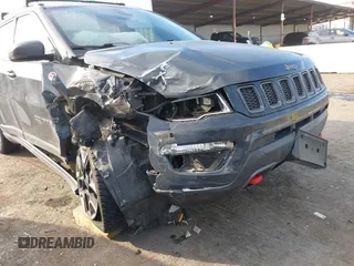 2017 Jeep Compass Trailhawk with VIN 3C4NJDDBXHT657425, listed as a IAAI auction lot 41022289 with 83,003 mi miles and . Bid and sale history available at DreamBid. Image 6.