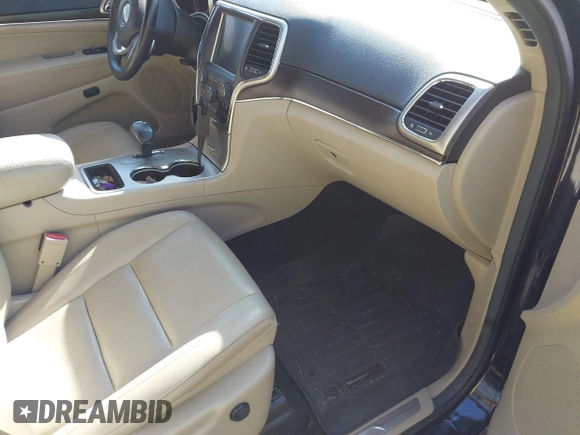 2014 Jeep Grand Cherokee Limited with VIN 1C4RJEBGXEC389361, listed as a IAAI auction lot 41772366 with 122,473 mi miles. Bid and sale history available at carsss.com. Image 5.
