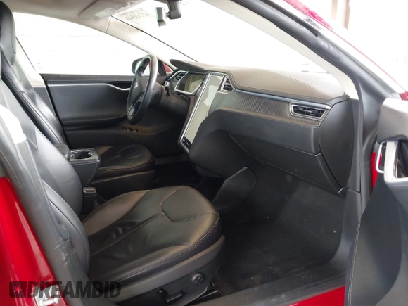 2013 Tesla Model S with VIN 5YJSA1CN7DFP26996, listed as a IAAI auction lot 42244540 with 128,160 mi miles and . Bid and sale history available at DreamBid. Image 5.