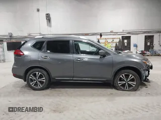 2017 Nissan Rogue S with VIN JN8AT2MV6HW275480, listed as a IAAI auction lot 41731679 with 143,932 mi miles and . Bid and sale history available at DreamBid. Image 13.
