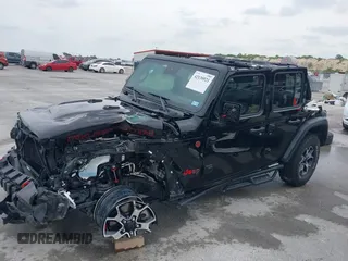2021 Jeep Wrangler Unlimited Rubicon with VIN 1C4HJXFG7MW662092, listed as a IAAI auction lot 42139521 with 32,055 mi miles and . Bid and sale history available at carsss.com. Image 18.