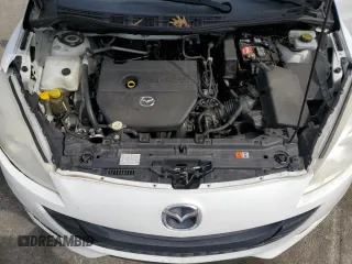 2015 Mazda 5 Sport z VIN JM1CW2BL1F0178961, wystawiony jako Copart lot #49853755 z przebiegiem 154 980 mil mil oraz Szkoda całkowita • Salvage title. Historia ofert i sprzedaży dostępna na DreamBid. Obrazek 14.