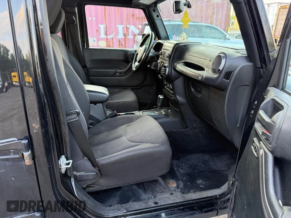2015 Jeep Wrangler Unlimited Sport with VIN 1C4BJWDG8FL502570, listed as a Copart auction lot 65854505 with 120,541 mi miles and Clean title. Bid and sale history available at DreamBid. Image 5.