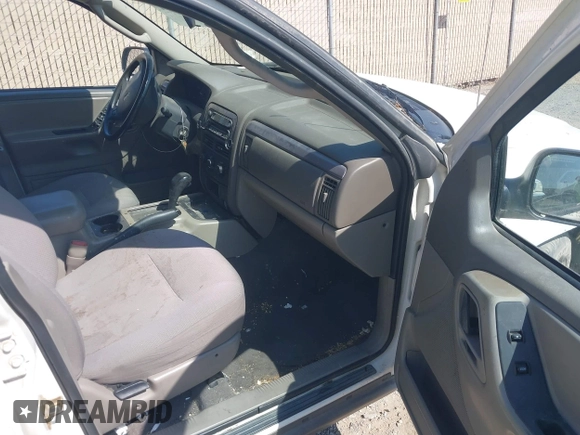 2004 Jeep Grand Cherokee Laredo with VIN 1J4GX48SX4C151160, listed as a IAAI auction lot 42765441 with 176,179 mi miles and . Bid and sale history available at DreamBid. Image 5.