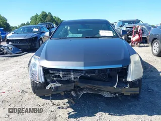 2013 Cadillac CTS Luxury with VIN 1G6DE5E5XD0146158, listed as a IAAI auction lot 42531205 with 130,669 mi miles and . Bid and sale history available at DreamBid. Image 13.