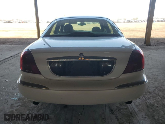 2001 Lincoln Continental with VIN 1LNHM97V31Y622782, listed as a Copart auction lot 74023344 with 116,672 mi miles and Salvage Title. Bid and sale history available at carsss.com. Image 6.