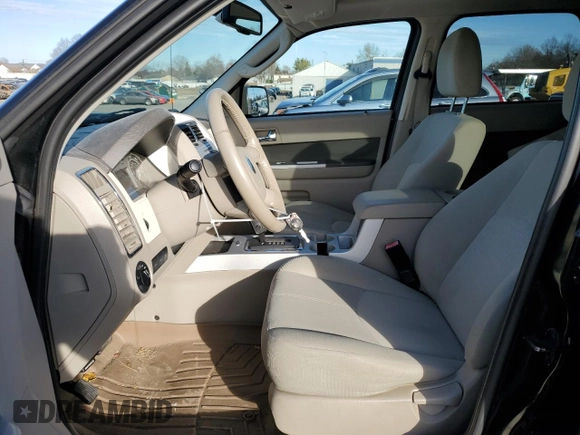 2009 Mercury Mariner with VIN 4M2CU91749KJ25449, listed as a Copart auction lot 81455734 with 144,065 mi miles and Salvage Title. Bid and sale history available at carsss.com. Image 7.