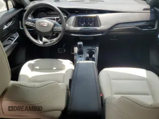 2019 Cadillac XT4 FWD Sport z VIN 1GYFZER47KF187301, wystawiony jako Copart lot #57715115 z przebiegiem 64 246 mil mil oraz Szkody całkowita. Historia ofert i sprzedaży dostępna na DreamBid. Obrazek 8.