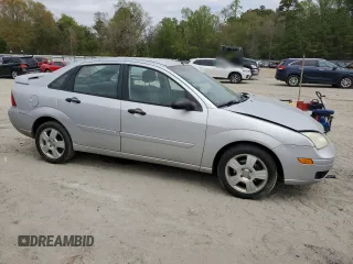2006 Ford Focus S with VIN 1FAHP34N56W109006, listed as a Copart auction lot 53987745 with 111,677 mi miles and Salvage Title. Bid and sale history available at carsss.com. Image 4.