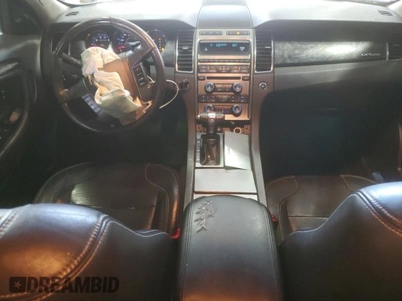 2012 Ford Taurus Limited with VIN 1FAHP2FW3CG113920, listed as a Copart auction lot 55565615 with 131,981 mi miles and Salvage title. Bid and sale history available at DreamBid. Image 8.