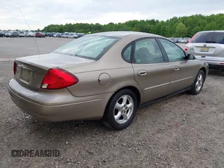 2003 Ford Taurus SE Standard with VIN 1FAFP53U93A100961, listed as a IAAI auction lot 42332144 with 196,990 mi miles and . Bid and sale history available at DreamBid. Image 4.