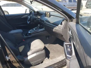 2020 Mazda CX-9 Sport with VIN JM3TCABY8L0407430, listed as a IAAI auction lot 42288490 with 50,317 mi miles and . Bid and sale history available at DreamBid. Image 5.