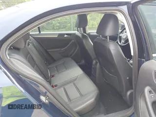 2014 Volkswagen Jetta TDI w/Premium/Nav z VIN 3VWLL7AJ8EM266890, wystawiony jako IAAI lot #42473906 z przebiegiem 146 306 mil mil oraz . Historia ofert i sprzedaży dostępna na DreamBid. Obrazek 8.
