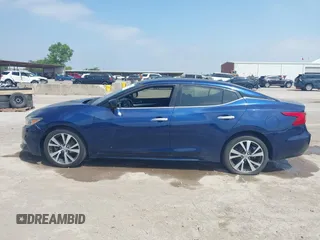 2016 Nissan Maxima SV z VIN 1N4AA6AP0GC444056, wystawiony jako IAAI lot #42336112 z przebiegiem 167 098 mil mil oraz . Historia ofert i sprzedaży dostępna na DreamBid. Obrazek 14.