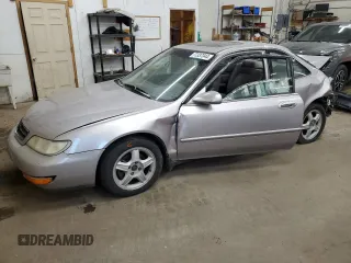 1997 Acura CL Premium z VIN 19UYA2258VL011453, wystawiony jako Copart lot #77337344 z przebiegiem 216 475 mil mil oraz Szkody całkowita. Historia ofert i sprzedaży dostępna na DreamBid. Obrazek 1.