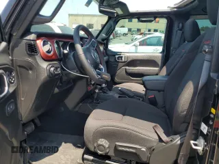 2023 Jeep Wrangler Rubicon с VIN 1C4HJXCG6PW679118, выставлен на аукционе Copart как лот 66469354 с пробегом 5 038 миль миль и Списание • Salvage title. История ставок и продаж доступна на DreamBid. Изображение 7.