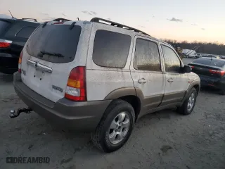2003 Mazda Tribute LX with VIN 4F2YZ94133KM20084, listed as a Copart auction lot 82598104 with 216,848 mi miles and Salvage Title. Bid and sale history available at carsss.com. Image 3.