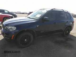 2012 BMW X5 35i с VIN 5UXZV4C5XCL749123, выставлен на аукционе IAAI как лот 41749728 с пробегом 124 193 миль миль и . История ставок и продаж доступна на DreamBid. Изображение 14.