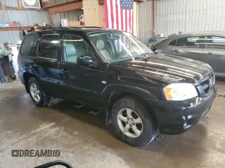 2005 Mazda Tribute S with VIN 4F2CZ06175KM24743, listed as a Copart auction lot 52815395 with 197,148 mi miles and Salvage Title. Bid and sale history available at carsss.com. Image 4.
