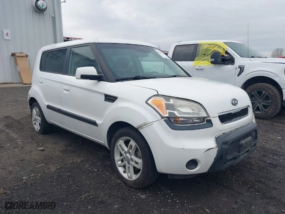 2010 Kia Soul + with VIN KNDJT2A29A7140838, listed as a IAAI auction lot 41012536 with 146,559 mi miles. Bid and sale history available at carsss.com. Image 1.