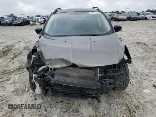 2016 Ford Escape SE z VIN 1FMCU0GX9GUB56962, wystawiony jako Copart lot #57071515 z przebiegiem 150 792 mil mil oraz Szkoda całkowita • Salvage title. Historia ofert i sprzedaży dostępna na DreamBid. Obrazek 5.