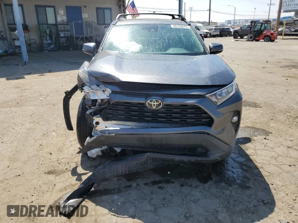 2020 Toyota RAV4 XLE with VIN 2T3W1RFV4LC044664, listed as a Copart auction lot 59163675 with 60,648 mi miles and Salvage title. Bid and sale history available at DreamBid. Image 5.