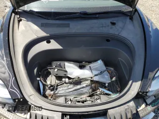 2020 Tesla Model 3 Long Range z VIN 5YJ3E1EBXLF795689, wystawiony jako Copart lot #56703555 z przebiegiem 62 556 mil mil oraz Szkoda całkowita • Salvage title. Historia ofert i sprzedaży dostępna na DreamBid. Obrazek 11.