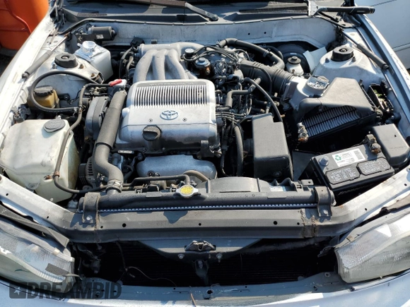 1992 Toyota Camry z VIN 4T1VK12E0NU015172, wystawiony jako Copart lot #58974095 z przebiegiem 210 163 mil mil oraz Szkoda całkowita • Salvage title. Historia ofert i sprzedaży dostępna na DreamBid. Obrazek 11.