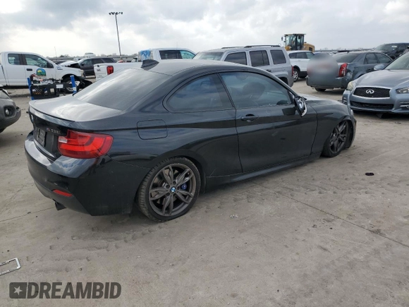 2015 BMW 2 Series M235i with VIN WBA1J7C50FV254060, listed as a Copart auction lot 43622085 with 61,397 mi miles and Salvage Title. Bid and sale history available at carsss.com. Image 3.