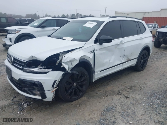 2020 Volkswagen Tiguan SE with VIN 3VV2B7AX1LM151388, listed as a IAAI auction lot 41480146 with 154,567 mi miles. Bid and sale history available at carsss.com. Image 2.