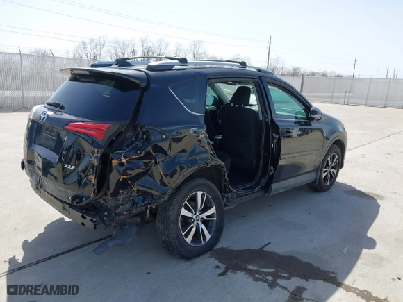 2016 Toyota RAV4 XLE with VIN 2T3WFREV9GW292772, listed as a IAAI auction lot 41727898 with 117,922 mi miles. Bid and sale history available at carsss.com. Image 4.