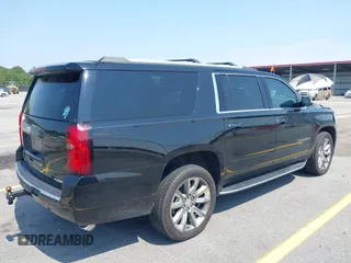 2019 Chevrolet Suburban LT with VIN 1GNSCJKC5KR304766, listed as a IAAI auction lot 42410264 with 105,171 mi miles and . Bid and sale history available at DreamBid. Image 4.