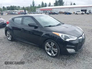 2012 Hyundai Veloster w/Gray Int with VIN KMHTC6AD4CU062034, listed as a IAAI auction lot 42371790 with 116,861 mi miles and . Bid and sale history available at DreamBid. Image 1.