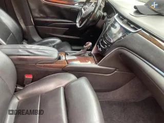 2013 Cadillac XTS Luxury z VIN 2G61P5S33D9171411, wystawiony jako Copart lot #59880945 z przebiegiem 268 029 mil mil oraz Czysty tytuł • Clean title. Historia ofert i sprzedaży dostępna na DreamBid. Obrazek 5.