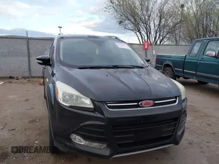 2015 Ford Escape Titanium with VIN 1FMCU9J96FUA27221, listed as a IAAI auction lot 41925276 with 180,758 mi miles and . Bid and sale history available at carsss.com. Image 12.