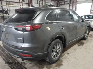 2019 Mazda CX-9 Touring with VIN JM3TCBCY3K0305147, listed as a IAAI auction lot 41676425 with 104,265 mi miles and . Bid and sale history available at carsss.com. Image 4.