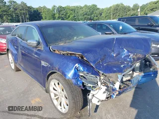 2015 Ford Taurus Limited with VIN 1FAHP2F86FG208798, listed as a IAAI auction lot 42679932 with 104,300 mi miles and . Bid and sale history available at DreamBid. Image 1.