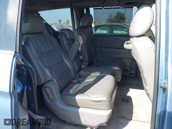 2010 Honda Odyssey Touring with VIN 5FNRL3H92AB056186, listed as a IAAI auction lot 41851386 with 199,109 mi miles. Bid and sale history available at carsss.com. Image 8.