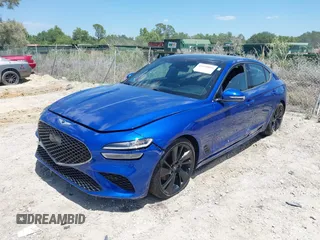 2023 Genesis G70 2.0T with VIN KMTG34TA1PU111825, listed as a IAAI auction lot 42030503 with 1 mi miles. Bid and sale history available at carsss.com. Image 2.